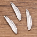 Polished silver 304 stainless steel fish pendants on wood for jewelry making - 6x27mm / Type 1 Steel Color