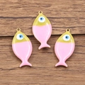 Pink and yellow fish-shaped charms with blue evil eye design for DIY jewelry making - 1 Piece / Pink