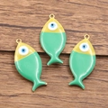 Golden stainless steel fish charms with yellow and green enamel evil eye details - 1 Piece / Dark Green