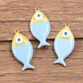 Golden fish charms with blue evil eye enamel finish for DIY jewelry making and pendants - 1 Piece / Sky Blue
