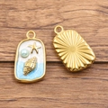 Rectangular gold-plated ocean pendant with seashell starfish charm and blue enamel inlay - Starfish Conch