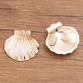 Golden acrylic seashell pendants for DIY jewelry making on a wooden background - Laser Gold No.4 Seashell 31X32mm 2g