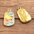 Pendentif hippocampe en acier doré avec émail bleu et détail de perle nacrée - Étoile de Mer Hippocampe