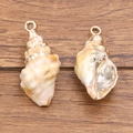 Pair of gold-plated acrylic seashell charms for DIY jewelry making on wood background - Laser Gold No.7 Seashell 17X40mm 4.1g