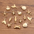 15pcs KC gold DIY alloy pendants featuring ocean charms like starfish, shells, and crabs - Starfish Shell Crab Mermaid Tail Collection (26B4)