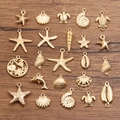 Colección de dijes marinos dorados con estrellas de mar y conchas para joyería DIY - Paquete de 10 Estilos Mixtos (Sin repetición) / Paquete de 10