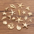 Golden ocean charms set including starfish, turtles and shells for DIY jewelry making - Random Assorted Mix