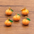 Five pieces of orange pumpkin pendants in gold-plated stainless steel with enamel - Orange Enamel Style