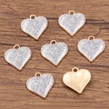 Set di sette ciondoli a forma di cuore con finitura glitter argento e retro dorato - Cuore (16X17mm 1.1g) / Bianco