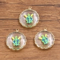 Pendentifs en verre plaqués or 18 carats avec motif délicat de tortue bleue et fleurs séchées - Tortue de Mer Verte