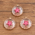 Lot de trois pendentifs ronds en verre doré 18 carats avec motifs d'étoiles de mer roses - Étoile de Mer Rose Rouge