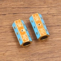 Perles hexagonales dorées avec émail bleu et orange et motifs d'étoiles pour bracelets - No. 4 Étoile Bleu / 10x20mm