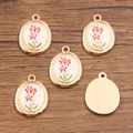 Cinque ciondoli floreali ovali placcati in oro con smalto rosa e fiori rossi - 16x21mm / Stile Motivo Floreale Bianco