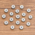 Set aus silbernen Edelstahl-Abstandshalterperlen mit Fischgrätenmuster für Schmuck - 9x2mm / Stahlfarben