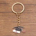 Gold graduation keychain with black mortarboard and white diploma scroll charms - Style 1 (19X29mm)