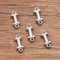 Silver stainless steel bone shaped charm with double loops for DIY jewelry making - 1616 Steel Color (5X13mm)