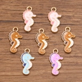 DIY colorful seahorse charms in gold alloy with pink, orange, and blue oil drip finish - Mixed Sea Horse