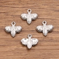 Set of 4 silver 304 stainless steel bee charms for jewelry making on wood background - 1609 Silver (Little Bee) / 11x11mm