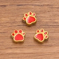 Three red enamel and gold-plated stainless steel dog paw charms for DIY jewelry making - Double Sided Enamel Dog Paw Bead / Red