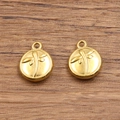 18K gold plated stainless steel circular charm featuring an embossed dragonfly motif - 1562 Gold (Dragonfly Disc)
