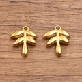 Deux breloques feuilles en acier inoxydable 304 doré pour la création de bijoux DIY - Style de Feuille (1542 Couleur Or)