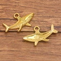 Juego de dos dijes de tiburón dorados en acero inoxidable 304 pulido con anillo de sujeción - Tiburón / Dorado