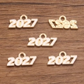 DIY 2027 gold alloy charms with white enamel finish for anniversary jewelry making - 2027 White