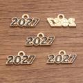 Pack of five 2027 year charms in gold-plated alloy with black and white enamel fill - 2027 Black