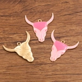 Pink enamel cow skull pendants in golden alloy finish for western jewelry DIY crafts - Pink Bull Head