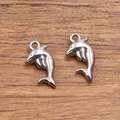 Deux pendentifs dauphins polis en acier inoxydable 304 pour la création de bijoux DIY - Forme de Dauphin (1543) / 1 Pièce/Paquet (7x14mm) / Acier
