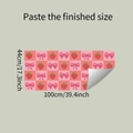 Detail of strawberry bow checkered wall sticker showing the adhesive backing and texture - 44X100CM