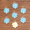 Ciondolo quadrifoglio in smalto azzurro con finitura in lega dorata per gioielli - 1 Pezzo / Blu