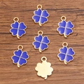 Ciondoli a quadrifoglio blu scuro in lega placcata oro per creazione gioielli fai-da-te - 1 Pezzo / Blu scuro