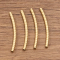 Set of four gold spiral textured stainless steel curved tube beads for DIY jewelry making - 2x30mm / Gold