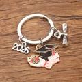 Class of 2026 graduation keychain with enamel graduation cap and silver charm pendants - Style 7 (22X27mm)