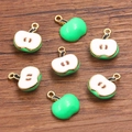 DIY jewelry charm pendant featuring green apple and sliced white apple designs - Green Apple
