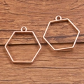 Set of two rose gold plated hexagonal charms with open geometric hollow design - Hexagonal Style / Rose Gold