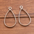 Silver teardrop hollow bezel pendants for DIY jewelry making on wooden background - Large Water Drop Style
