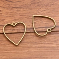 Pair of vintage bronze heart-shaped hollow open bezels for DIY resin jewelry making - Heart