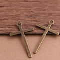 Coppia di ciondoli a croce in bronzo con asola per la creazione di gioielli fai-da-te vintage - Bronzo Antico 24 G