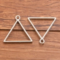 Silver triangle open bezel pendants for DIY jewelry making on wooden background - Small Triangle Shape