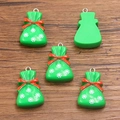 DIY green resin Christmas gift bag charms with red bow and white snowflake patterns - No.1 Green