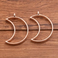 Crescent moon shaped rose gold DIY alloy jewelry pendant charms on wood background - Moon Style / Rose Gold
