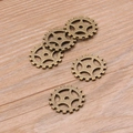 Retro bronze alloy gear charms for steampunk jewelry making on wooden background - Ancient Bronze 1.4g