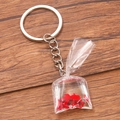 Red goldfish resin keychain in a transparent water bag charm with silver metal ring - Deep Red Goldfish