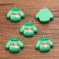 DIY Christmas resin pendant featuring a green sweater design with festive red stripes - Size 18