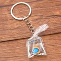 DIY transparent resin fish bowl keychain with a blue tropical fish and silver ring - Blue Tropical Fish #4