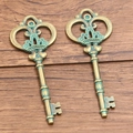 Pair of retro bronze alloy crown key pendants with vintage green patina for DIY jewelry - 8 Key 31X82mm 10.6g