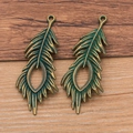 Antique bronze peacock feather pendants for DIY jewelry making in a vintage metal finish - Antique Copper Green