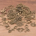 Variety of antique bronze mixed alloy pendants for DIY jewelry making on wood - Mixed Styles (30-45 Types) / 100g Pack / Antique Bronze